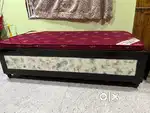 Diwan with storage boxes