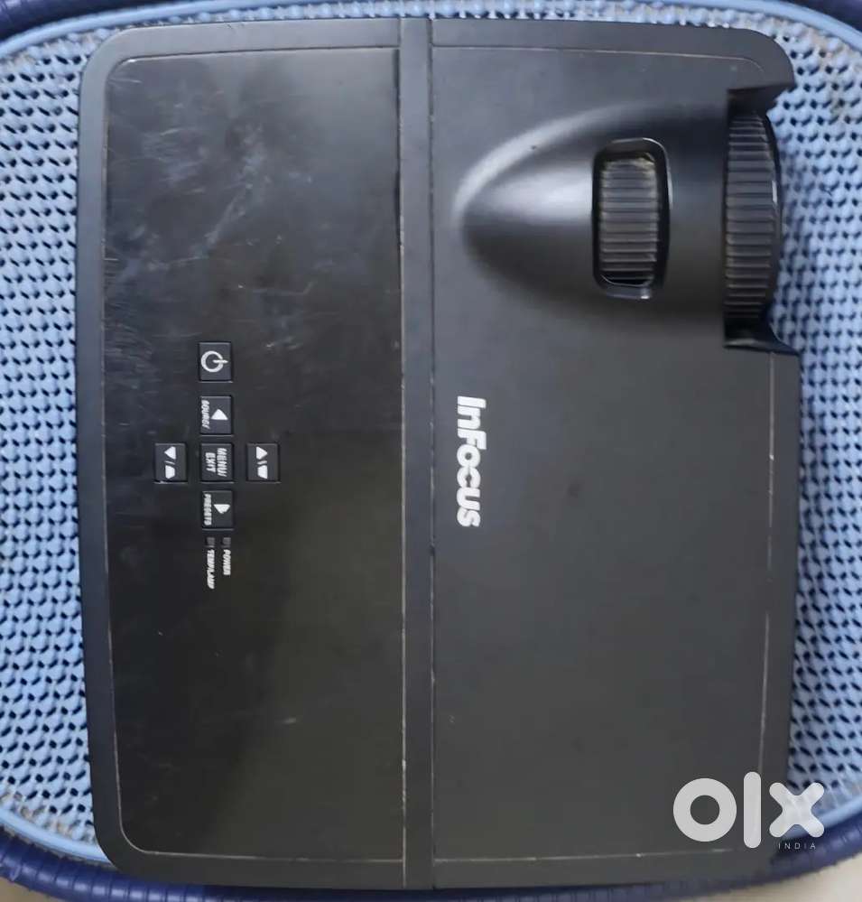 Projector ( inFocus IN112) with Moiz Wall screen .