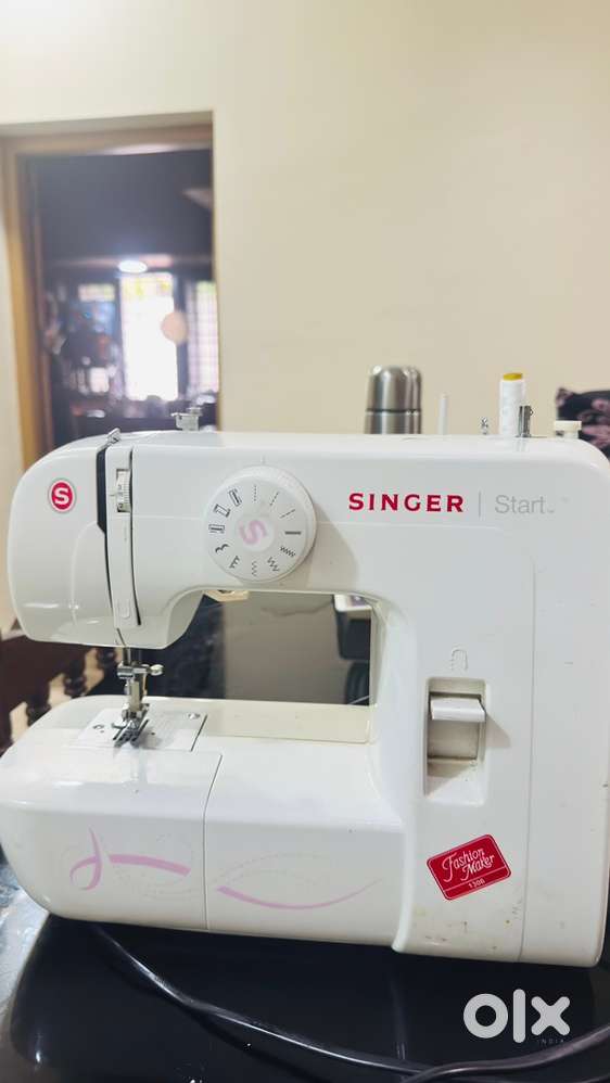 SINGER SEWING MECHINE ELECTRIC