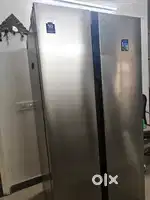 Side by side 1 year old jumbo refrigerator hardly used
