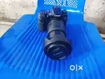 Canon DSLR 70D with lens 18-200