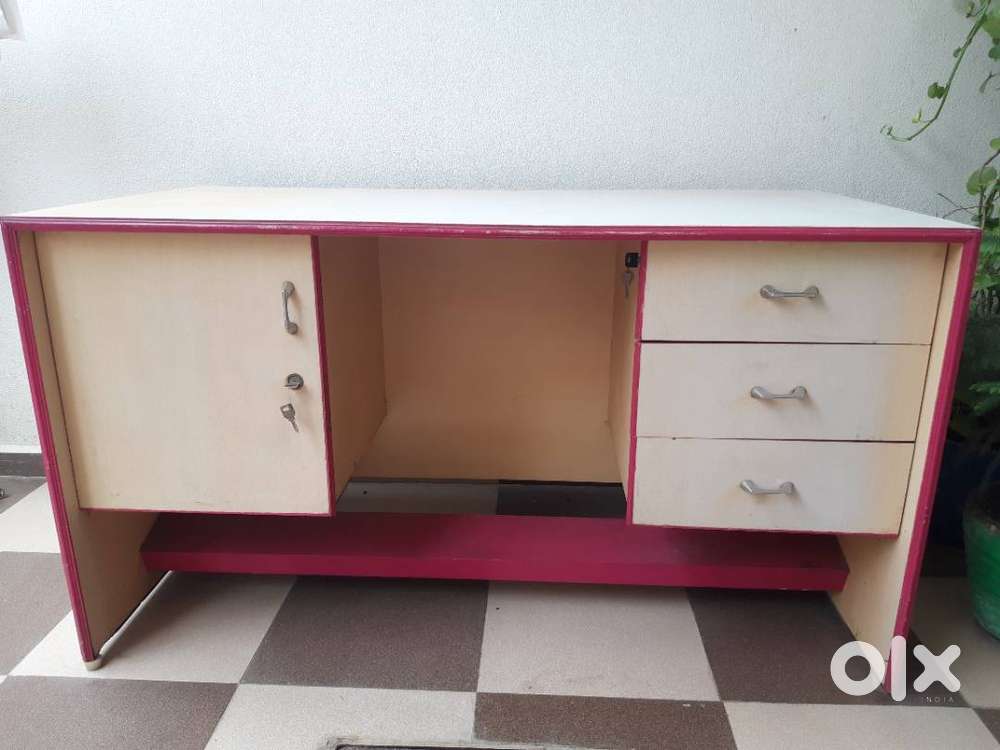 Cream and maroon color Wooden table , can be use for office work