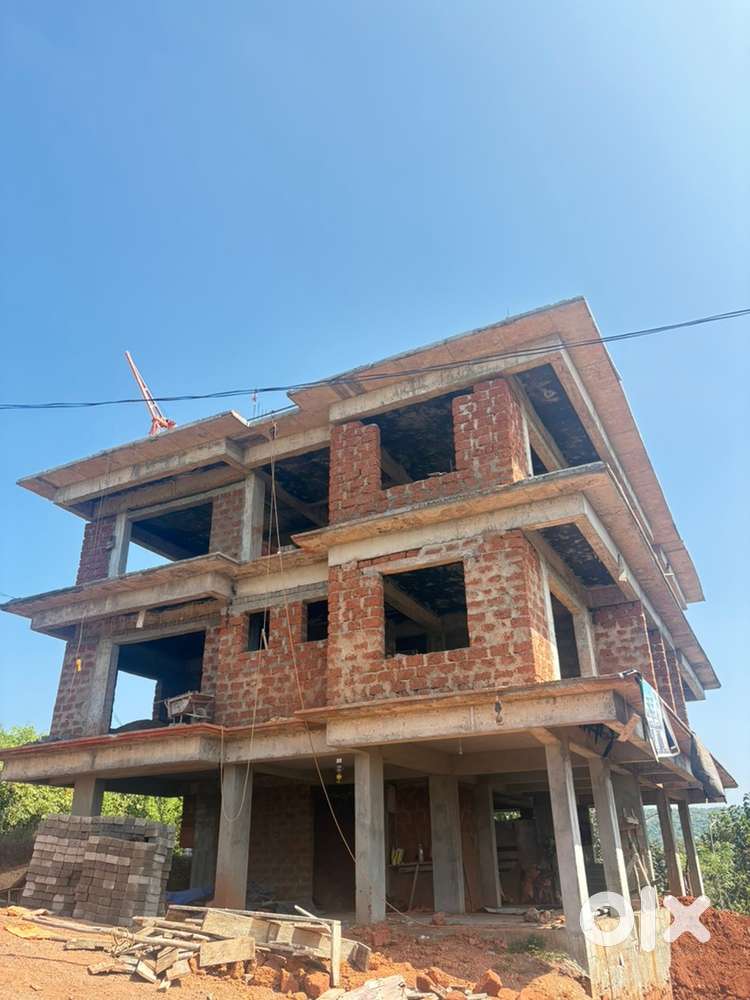 Building and plot for sale