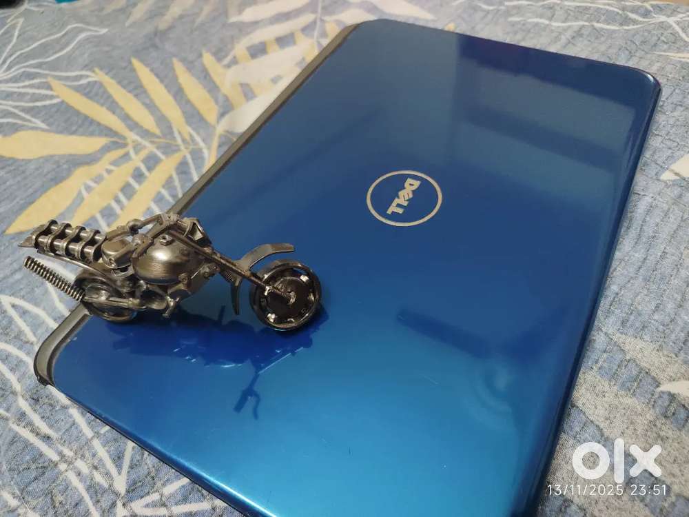 Dell Inspiron N5010 laptop with charger