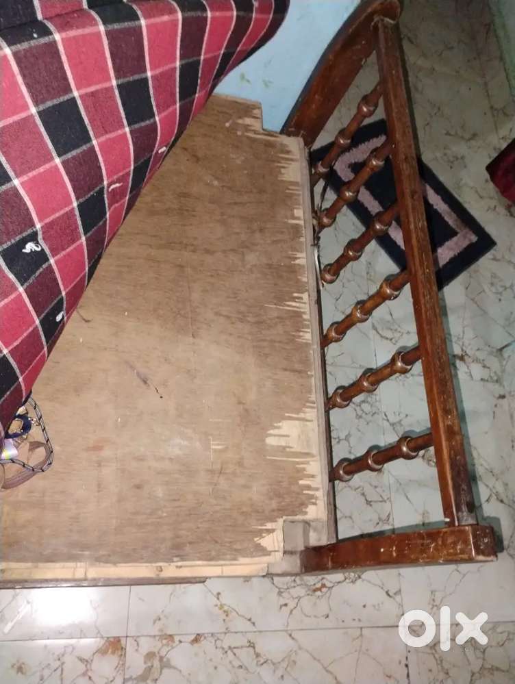 Wooden single bed