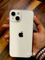 iPhone 13 in starlight colour available with accessory