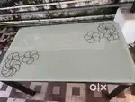 4 seater glass dining table