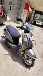 Suzuki access 125 good candison salf start new tayars good  milage