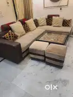 6 seater sofa with table and puffy