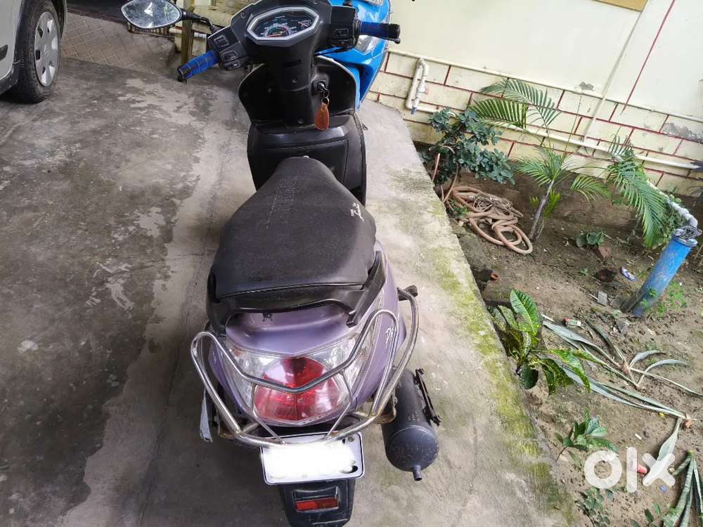 Pleasure scooty 2017 model white purple copour