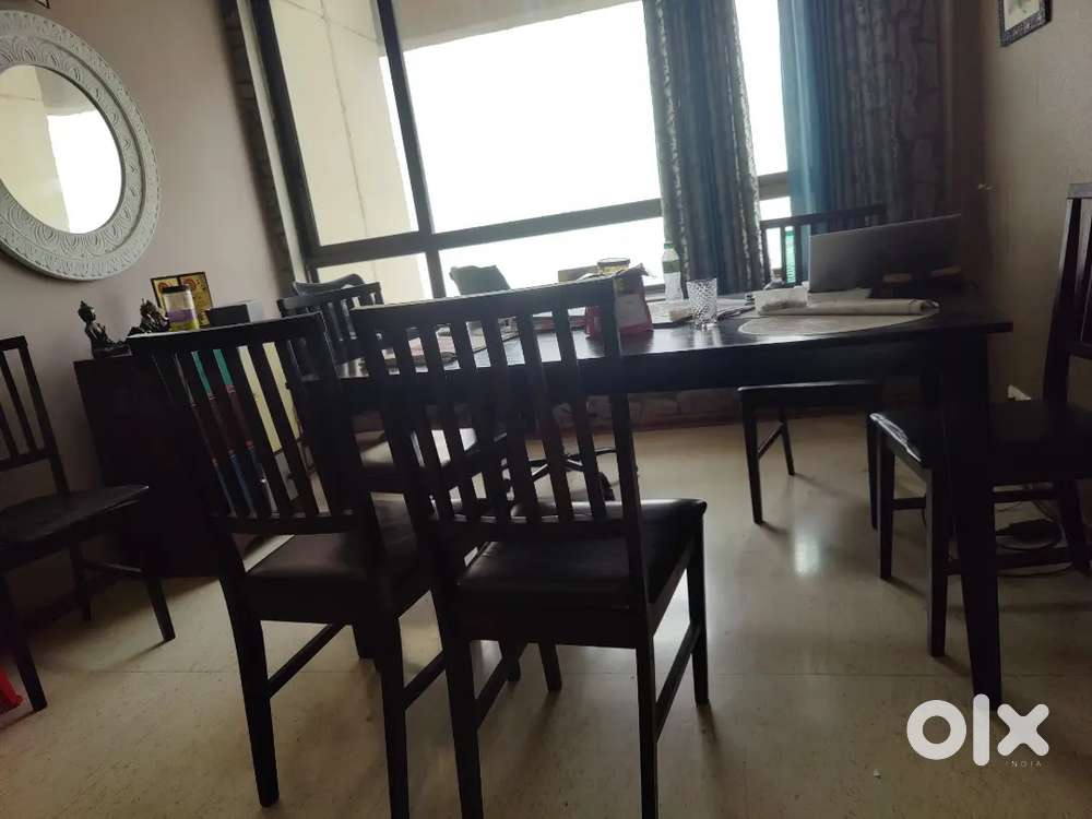 6-seater wooden dining table