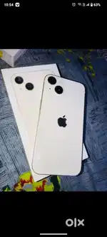 Selling my 4 months old I phone 13 in white colour/.Need urgent money