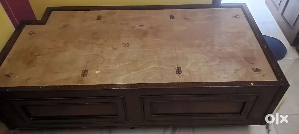 Selling single wooden Bed with storage