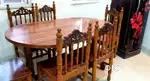 Teak wood dining table with six chairs