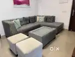 6 seater sofa with center table with 2 puffies