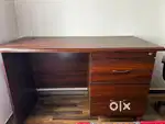 Damro Office table with two drawers and a black revolving chair
