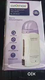 Roll on depilatory wax heater