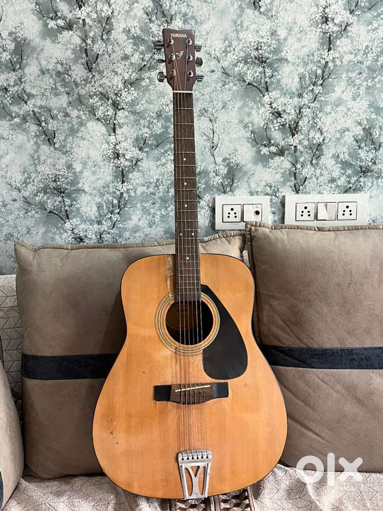 Selling my Yamaha F310 acoustic guitar for ₹4,500 (negotiable).