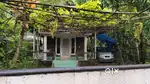 House and plot with full wall