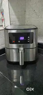 tables, chairs, hot water kettle, bags, Air fryer American Micronic,