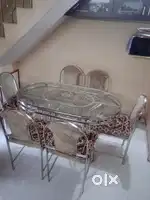 Glass and steel dining table