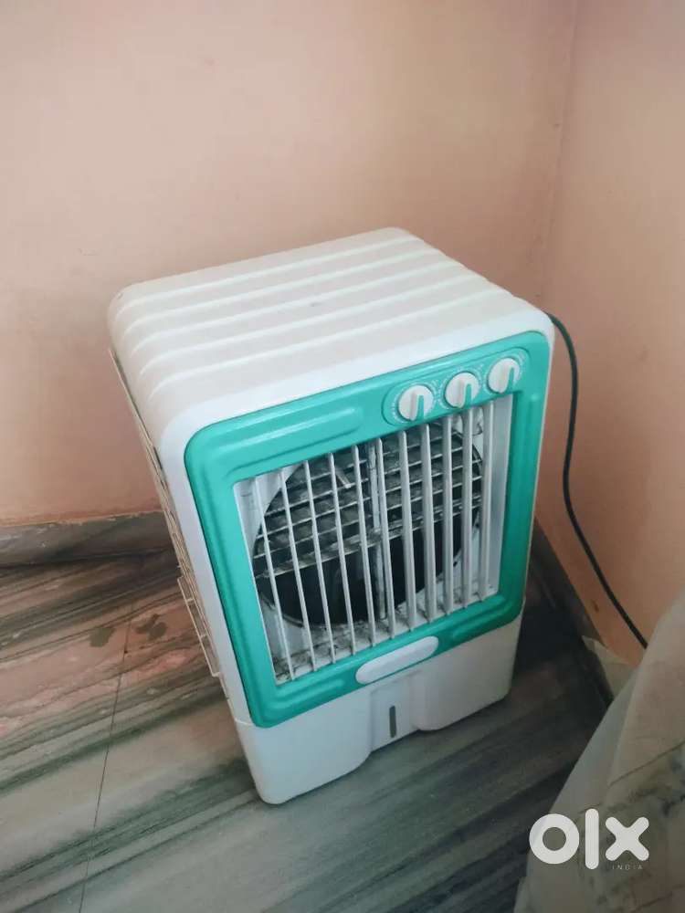 Plastic air cooler, good condition, working perfectly, only ₹1000.