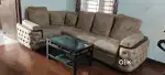 L shape sofa for sale with a center table