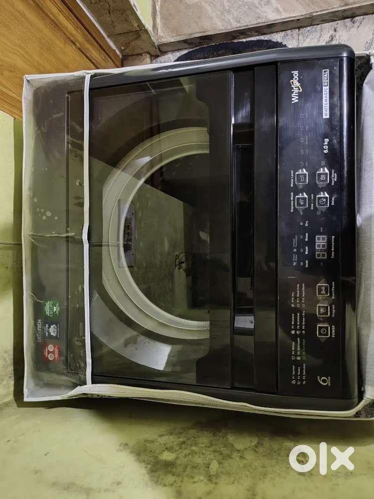 Whirlpool washing machine fully automatic top load 6 kg under warranty