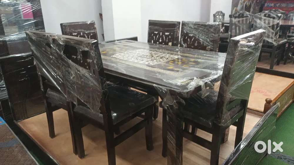 Dinning table Teakwood 6 chairs free delivery