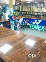 Salesman in sports showroom