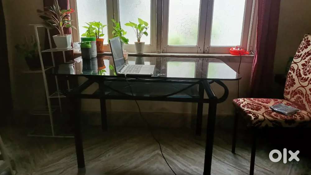 Glass and iron dining  table 4 seater