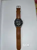 Fastrack leather digital watch.
