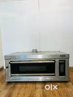 Gas pizza oven , steel table
