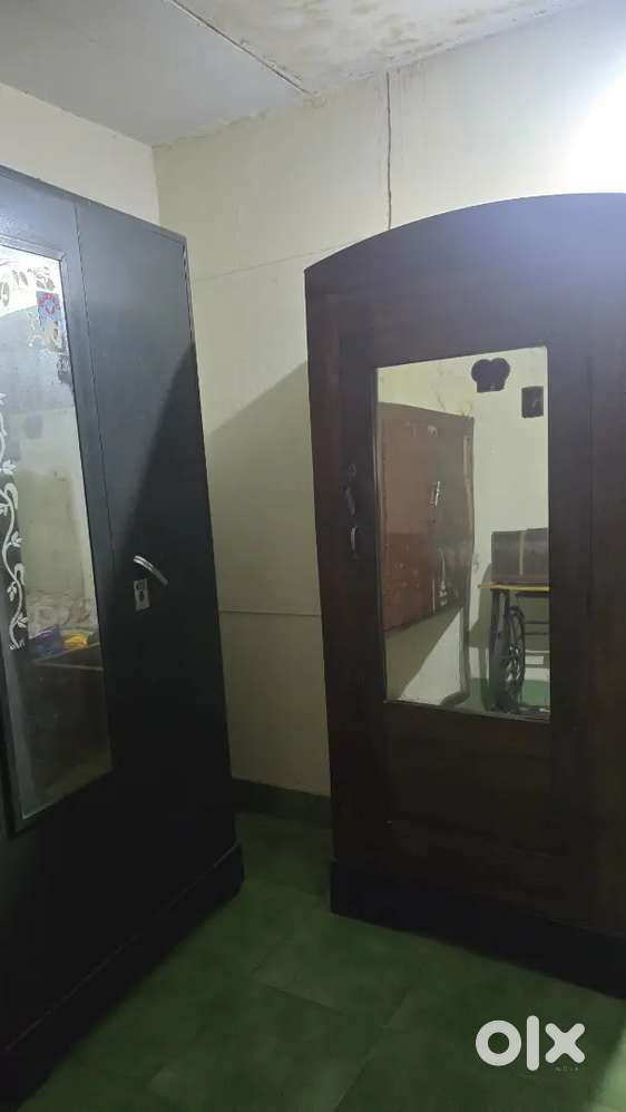 Steel wardrobe and a wooden wardrobe