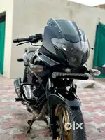 Pulsar 220f all original new rear tyre with modified exhaust