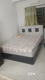 Teak wood double bed with box. Negotiable