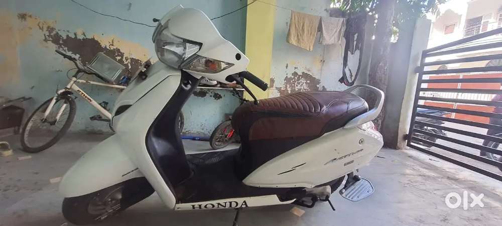 Super condition,new tyre, white metallic colour,all lights working