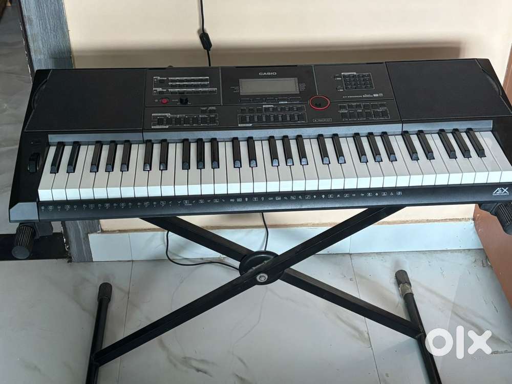 1 year old Casio CT-X9000IN
