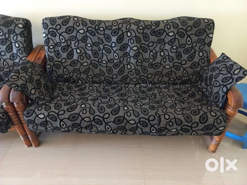 Wooden cushion sofa set (3+1+1 seater) in neat condition