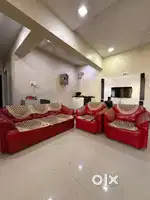 Red leather sofa 3+1+1 in good condition