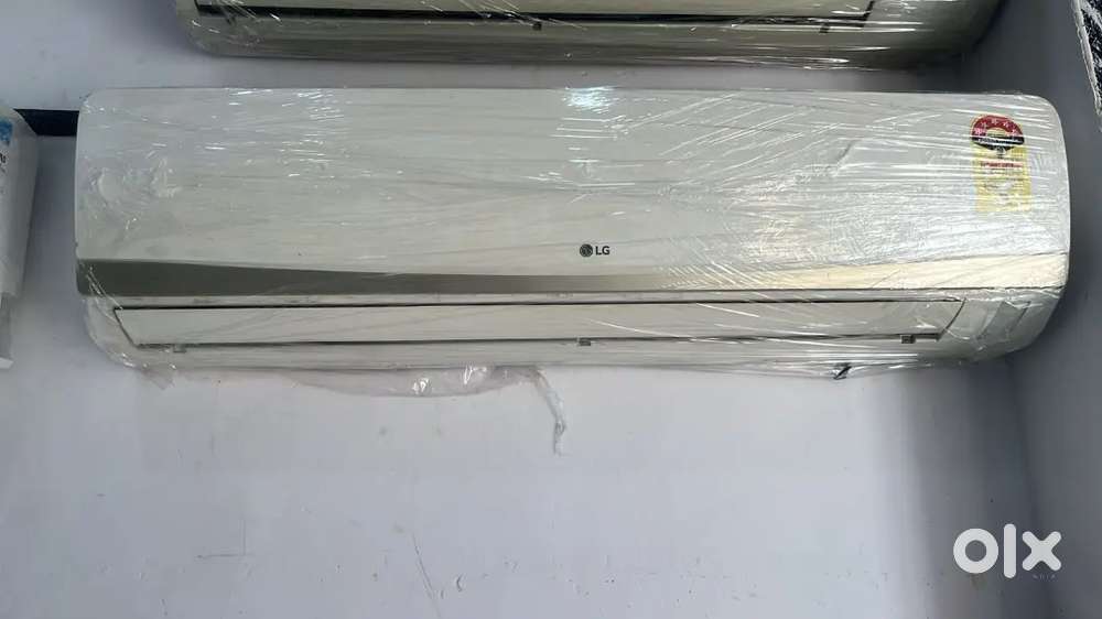 L. G 2 ton split AC with warranty good condition