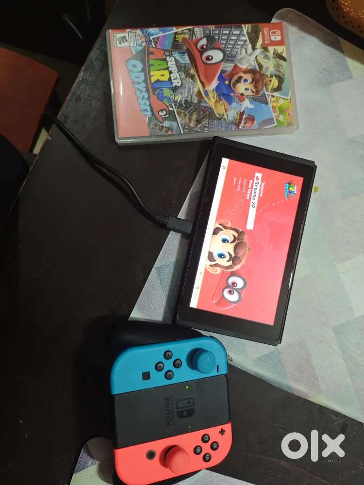 Nintendo Switch with Mario Odyssey and Carry Bag