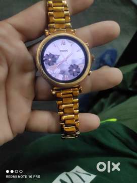 Fossil and fitbit sense watch