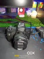 Canon m50 with charger battery warrenty card