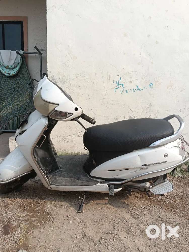 White Activa sale new engine and nice scooter
