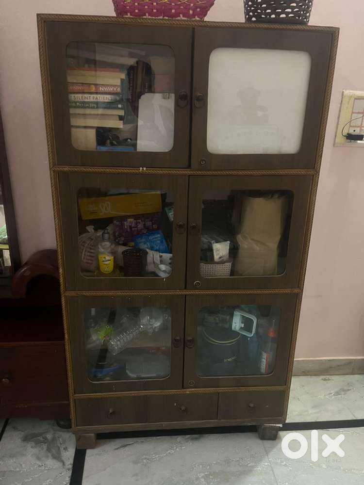 Want to sell urgently Wooden Almirah, TV & trolly