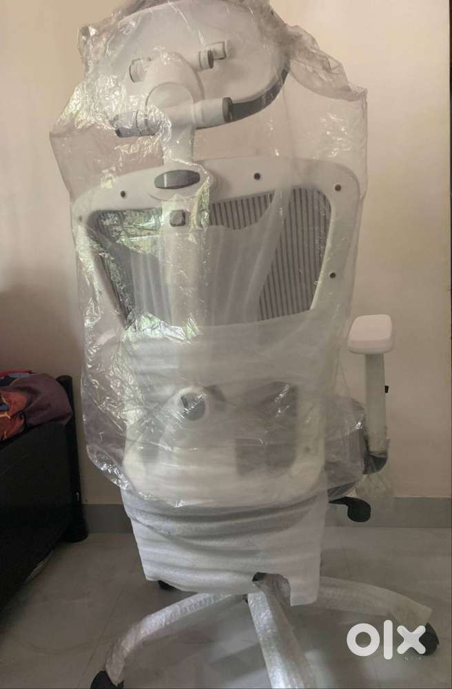 New Ergonomic Office Chair and Dining Table along with chairs