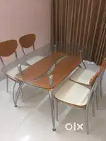 4 seater glass dining table