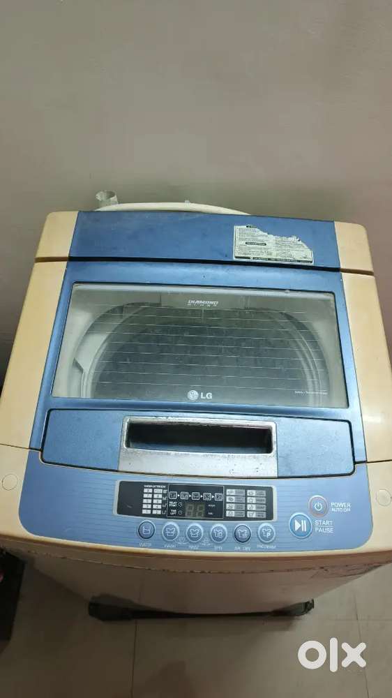LG WASHING MACHINE FULLY AUTOMATIC WITH IRON STAND.