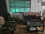 Teak sofa with cushion